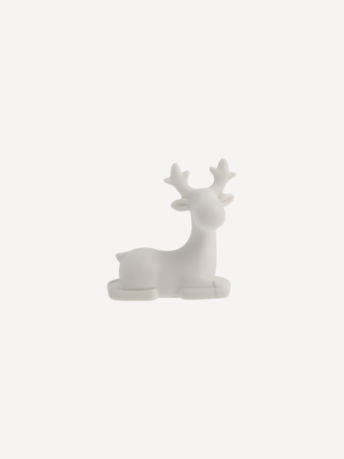 Sten reindeer made of ceramic, resting